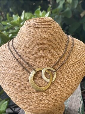 Marjorie Baer mixed metals double ring hand, hammered pendant necklace